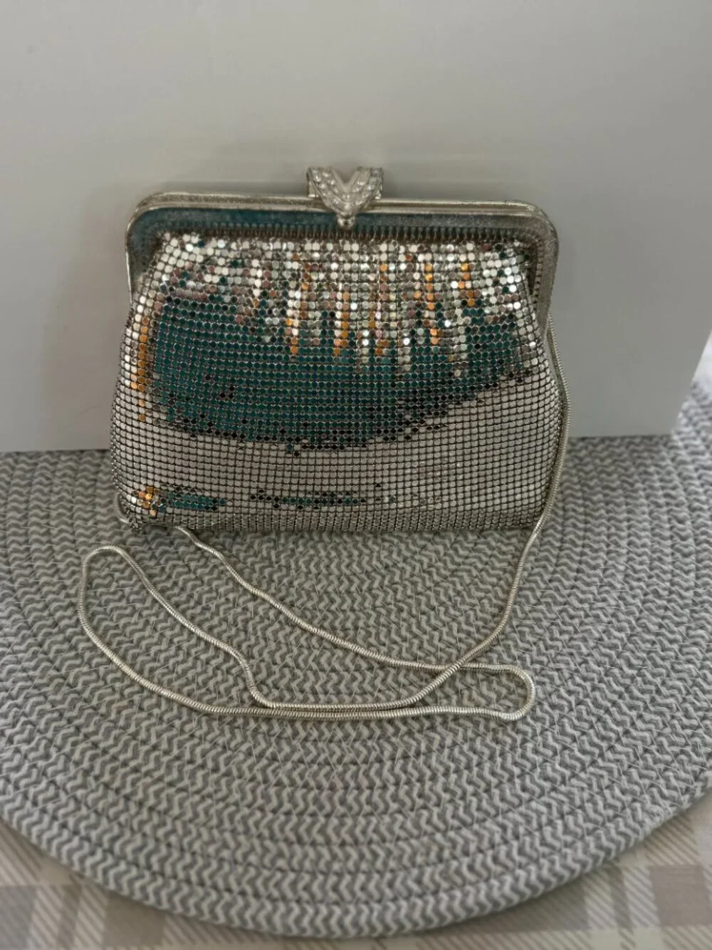 Silver colored mesh pattern purse/clutch